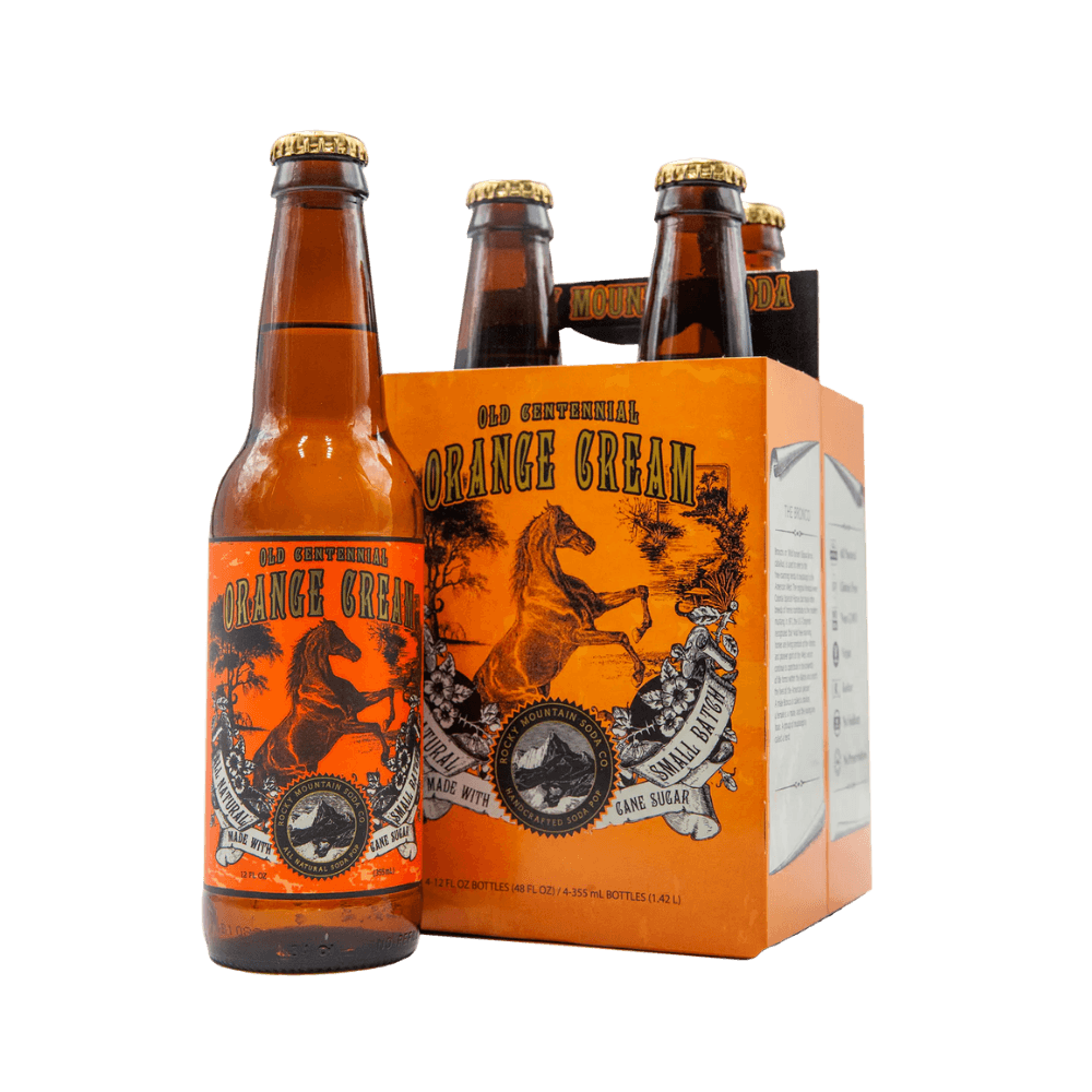 Brown bottle of Old Centennial Orange Cream soda with mare illustration on label pictured beside four-pack
