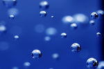 Close-up view of bubbles in a glass of carbonated water
