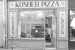 Black and white photo of shop labelled 'KOSHER PIZZA' with Jewish stars