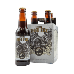Brown bottle of Boulder Birch Beer by Rocky Mountain Soda Co. pictured beside four-pack.