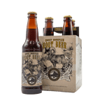 Brown bottle of Rocky Mountain Root Beer soda with bighorn sheep illustration on label pictured beside four-pack