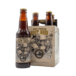 Brown bottle of Rocky Mountain Root Beer soda with bighorn sheep illustration on label pictured beside four-pack