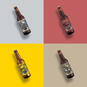 Four assorted soda bottles with gray, light red, yellow and beige packaging pictured in grid formation.